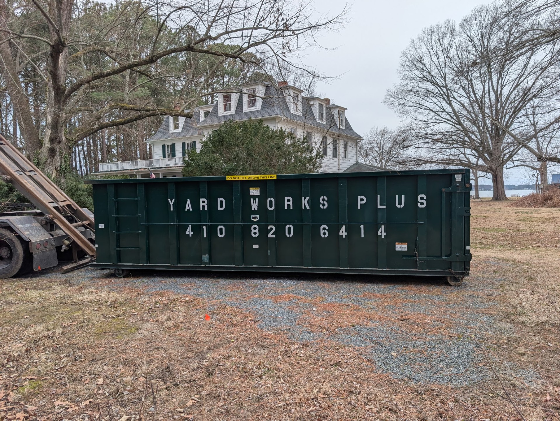 Yard Works Plus 30 yard dumpster delivered to a historic Eastern Shore property
